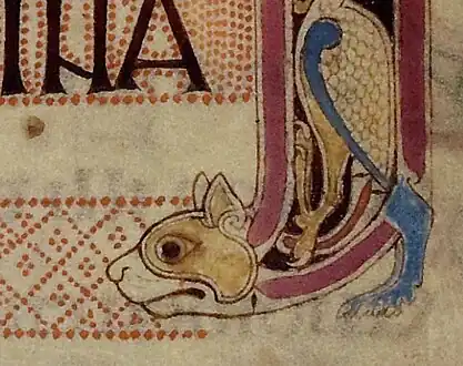 Decorados en forma de gato estirado de los Evangelios de Lindisfarne, fol. 139r.