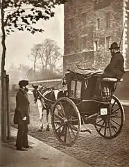 Hansom cab en Londres en 1877.