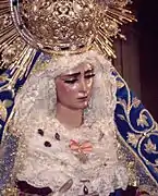 Nuestra Señora de la Angustias Coronada, José Paz Vélez le talla unas manos nuevas en 1957.