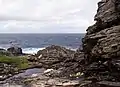 Marea baja por debajo de los acantilados del cabo Malin.