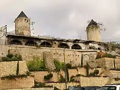 Molinos de el Jonquet, cuya ubicación es el distrito Poniente.