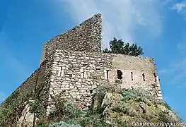 Wall with triangular tower