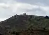 Ermita de la Virgen de la Naranja situada en una loma, en las afueras