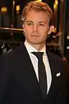 Nico Rosberg in a suit in 2015