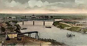 Puente carretero y puente del ferrocarril hundido circa 1905.