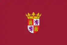 Pendón oficial de Castilla y León, que lleva el escudo de la comunidad «sobre un fondo carmesí tradicional»