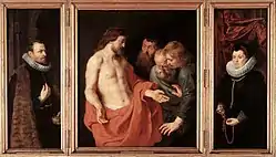 Rubens, tríptico Rockox. En este caso, la llaga es casi inperceptible y se encuentra en el costado erróneo. Retratos de los donantes en los laterales.