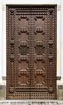 Detalle de la puerta en madera, obra de Pier Francesco de Ventura, de Pescia, finalizada en 1532
