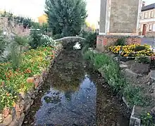 Presa y pontón de piedra en Gallegos de Curueño