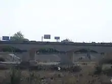 Rambla del Poyo en el término de Ribarroja. Antiguo puente de la carretera de Madrid.