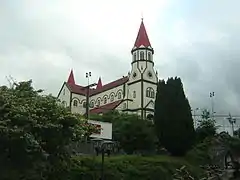 Parroquia del Sagrado Corazón de Jesús, de estilo neorrománico y barroco.