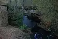 El puente de la Foz, sobre el río Chamoso, cerca de la desembocadura en el río Miño, entre los ayuntamientos de Lugo y O Corgo.