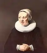 Retrato de matrimonio de su esposa Adriaantje Hollaer, pintado por el taller de Rembrandt, aproximadamente al mismo tiempo y considerado pareja del hombre del sombrero.