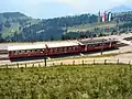 Coche motor eléctrico con remolques de pasajeros (Ferrocarril Vitznau-Rigi Bahn, Suiza)