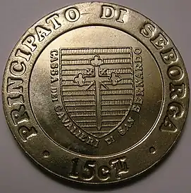 Anverso de una moneda de Luigino