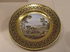 Plato de porcelana dura. Decorado en azul y oro, Sèvres, 1814.