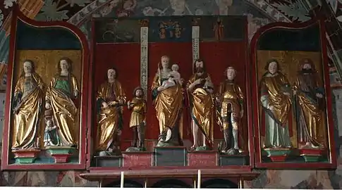 Tríptico escultórico (abierto) en la iglesia de Sogn Gieri (Suiza, siglo XIV).