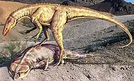 Staurikosaurus comiendo un rincosaurio