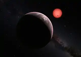 Esta ilustración muestra una vista imaginaria desde cerca de uno de los tres planetas que orbitan a una estrella enana ultrafría a tan solo 40 años luz de la Tierra, descubierto usando el telescopio TRAPPIST, instalado en el Observatorio La Silla de ESO. Estos mundos tienen tamaños y temperaturas similares a los de Venus y la Tierra y son los mejores objetivos encontrados hasta ahora para la búsqueda de vida fuera del sistema solar. Son los primeros planetas descubiertos alrededor de una estrella tan pequeña y débil. En esta ilustración, uno de los planetas interiores es visto en tránsito a través del disco de su pequeña y tenue estrella.