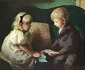 El platero y diseñador de juguetes Kay Bojesen de niño jugando a las cartas con su hermana Thyra