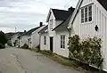 Desarrollo de casas pequeñas en Torggate (calle).