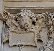 Tournoer: putto.