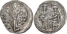 Anverso y reverso de una moneda de plata; el primero con una imagen de pie de la Virgen María, el segundo con dos figuras de pie, la de la izquierda vestida de gala y la de la derecha como un santo guerrero, entregando un castillo al primero