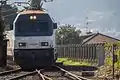 Un Trenhotel de Renfe procedente de Barcelona con destino Vigo haciendo una parada comercial en la estación de Guillarei.