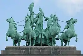 «Brabante izando la bandera nacional» o cuadriga de Brabante (1905), de  Thomas Vinçotte (1850-1925) y Jules Lagae (1862-1931).Parque del Cincuentenario, Bruselas.