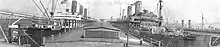 El USS Imperator (izq.) atracado junto al USS Leviathan (der.) en Hoboken (Nueva Jersey)