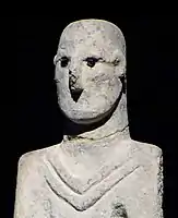 Hombre de Urfa, con piedras de obsidiana por ojos.