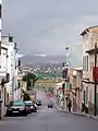 Calle de San Jorge con el atardecer de fondo.