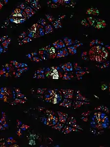 Detalle del gran rosetón occidental de la catedral de Reims.