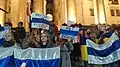 Bandera blanquiazul en Tiflis, Georgia, el 2 de marzo de 2022