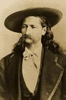 Wild Bill con sombrero y levita