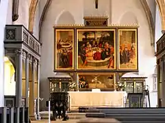 El retablo en la Iglesia de la ciudad de Wittenberg pintado por Lucas Cranach el Viejo y su hijo Lucas Cranach el Joven.