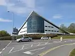 Wrexham Swimming Baths, ahora Wrexham Waterworld Leisure and Activity Centre, cuenta con un techo de paraboloide hiperbólico en Wrexham, Gales, Reino Unido, 1969