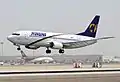 Boeing 737-322 de Magnicharters XA-UNY aterrizando en el Aeropuerto Internacional Harry Reid.