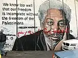 Mural de Morgan Freeman con una cita de Nelson Mandela