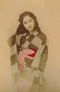 Mujer japonesa con abanico.