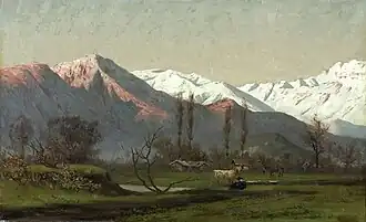 Paisaje con cordillera y vacunos.