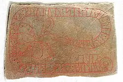 Piedra Ög 111 con una cruz en estilo Ringerike