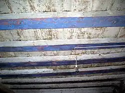 Detalle de la armadura del piso del coro en la iglesia parroquial de Arroyo Cerezo, Castielfabib (Valencia).