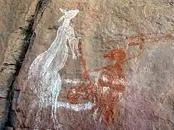 Canguro y cazador en el Anbangbang Rock Shelter, Kakadu (datación imprecisa), arte aborigen de Australia.