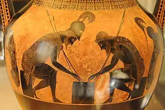 Aquiles y Áyax jugando a los dados, en un ánfora de cerámica de figuras negras de Exequias. Hacia 540 a. C.[31]​