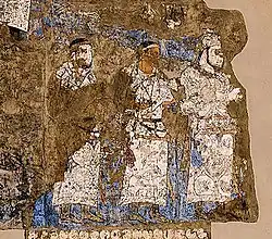 Embajadores de Chaganian (figura central, inscripción del cuello), y Chach (actual Tashkent) ante el rey Varkhuman de Samarcanda. 648-651 CE, murales de Afrasiyab, Samarcanda.[1]​[10]​