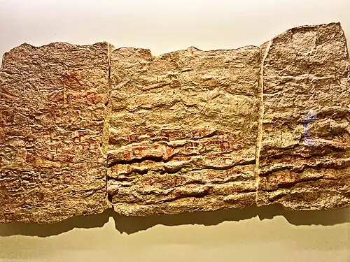 Pintura mural de Çatalhöyük, donde aparecen las casas de la ciudad y el volcán que está junto a la población.