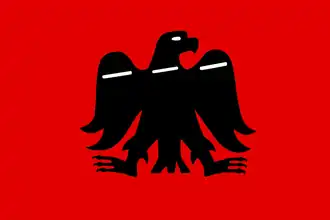 Bandera alternativa con el Arrano Beltza sobre fondo rojo, aludiendo al color representativo del reino de Navarra