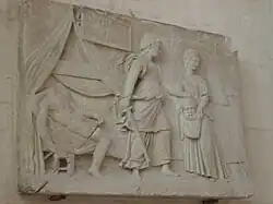 Bajorrelieve de finales del siglo XVI o inicios del XVII que representan a Judith que viene de decapitar a Holofernes.