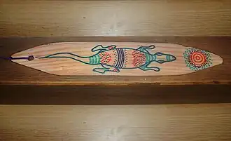 Bramadera de madera de pino (dimensiones: 30x5x0,7cm).